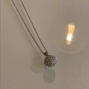 Necklace with sparkly ball pendant